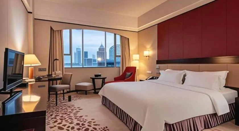 Bed in Shunde Emperor Hotel