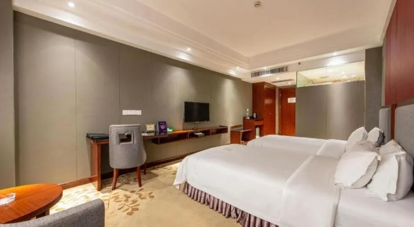 Bed in Shunde Emperor Hotel