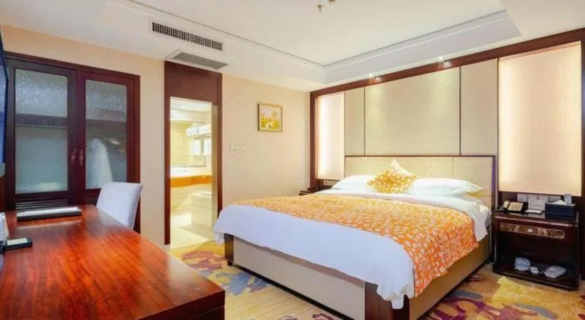 Bed in Haikou Conifer Garden Hotel