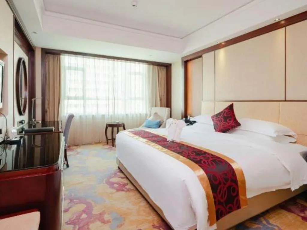 Bed in Haikou Conifer Garden Hotel