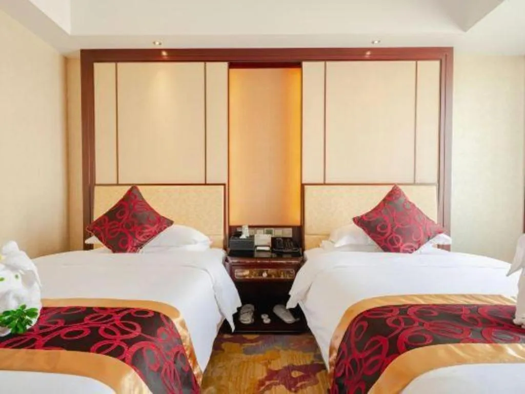 Bed in Haikou Conifer Garden Hotel