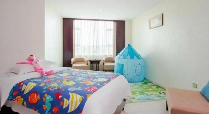 Bed in Haikou Conifer Garden Hotel