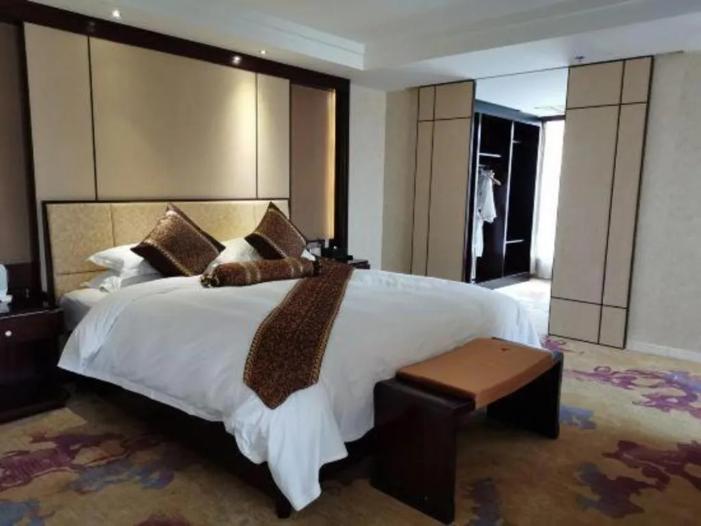 Bed in Haikou Conifer Garden Hotel