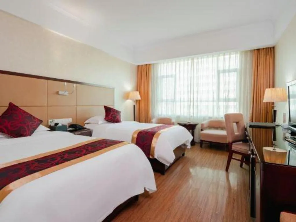 Bed in Haikou Conifer Garden Hotel