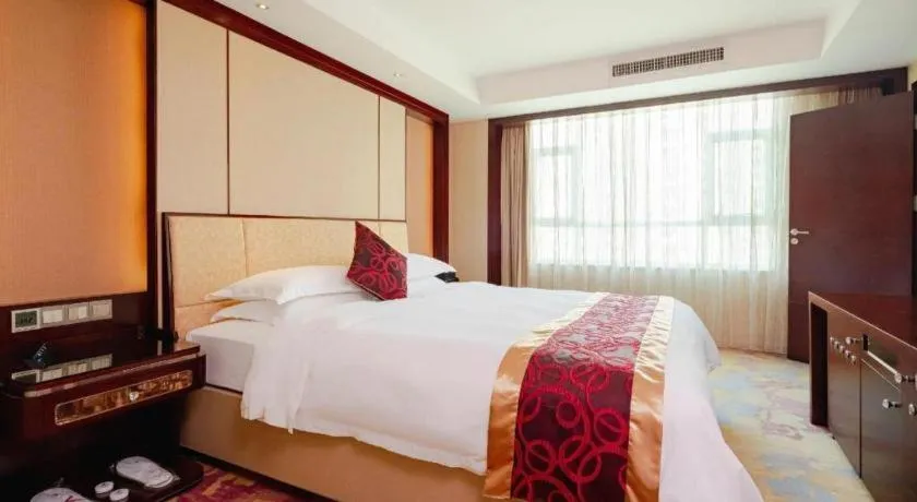 Bed in Haikou Conifer Garden Hotel