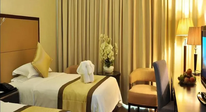 Bed in Haikou Conifer Garden Hotel