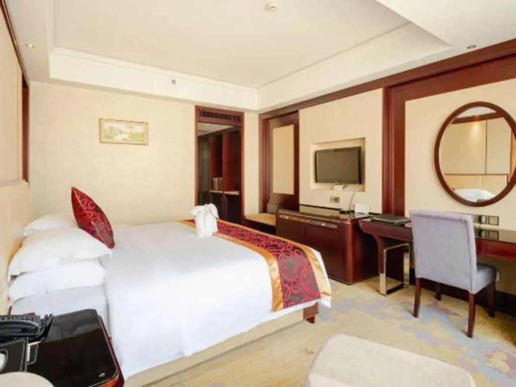 Bed in Haikou Conifer Garden Hotel