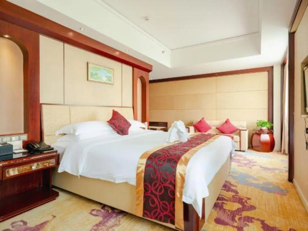 Bed in Haikou Conifer Garden Hotel