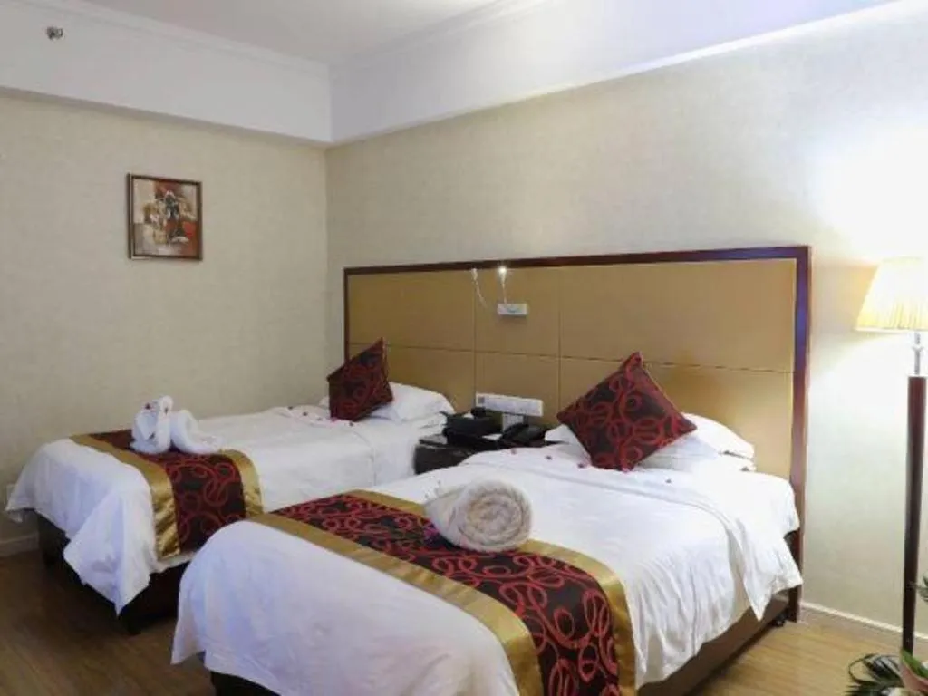 Bed in Haikou Conifer Garden Hotel