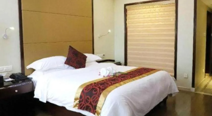 Bed in Haikou Conifer Garden Hotel