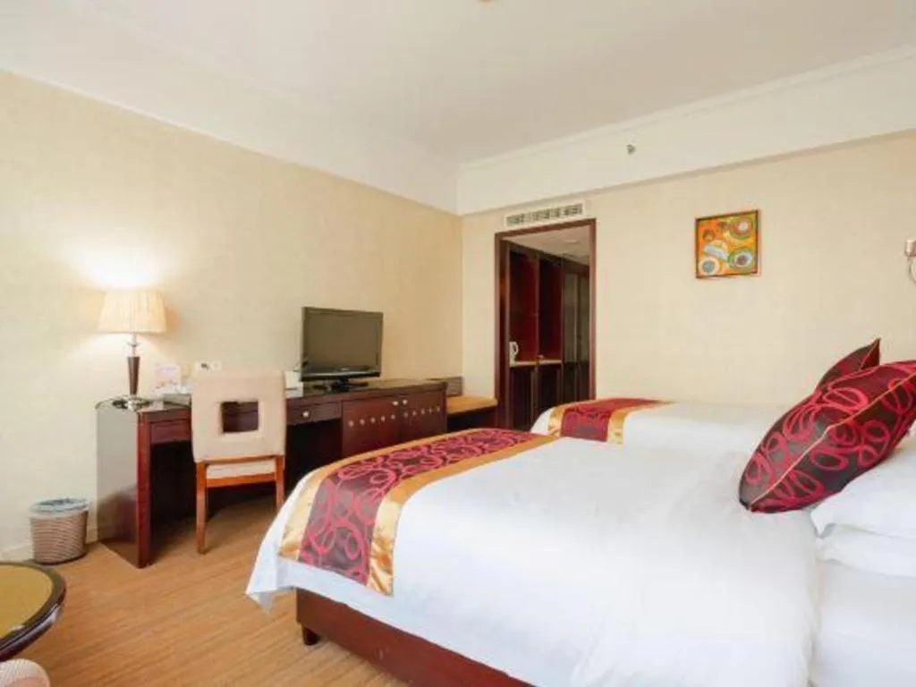 Bed in Haikou Conifer Garden Hotel