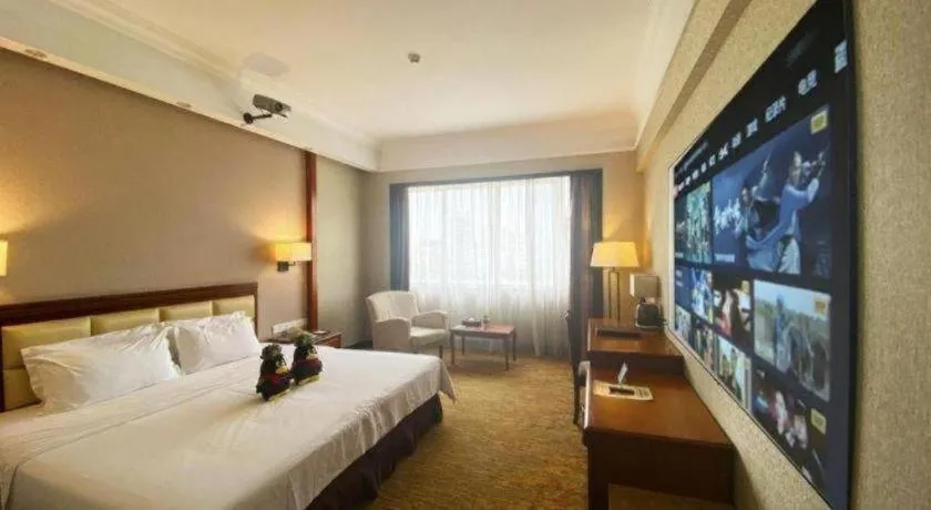 Bed in Fangzhong Holiday Hotel