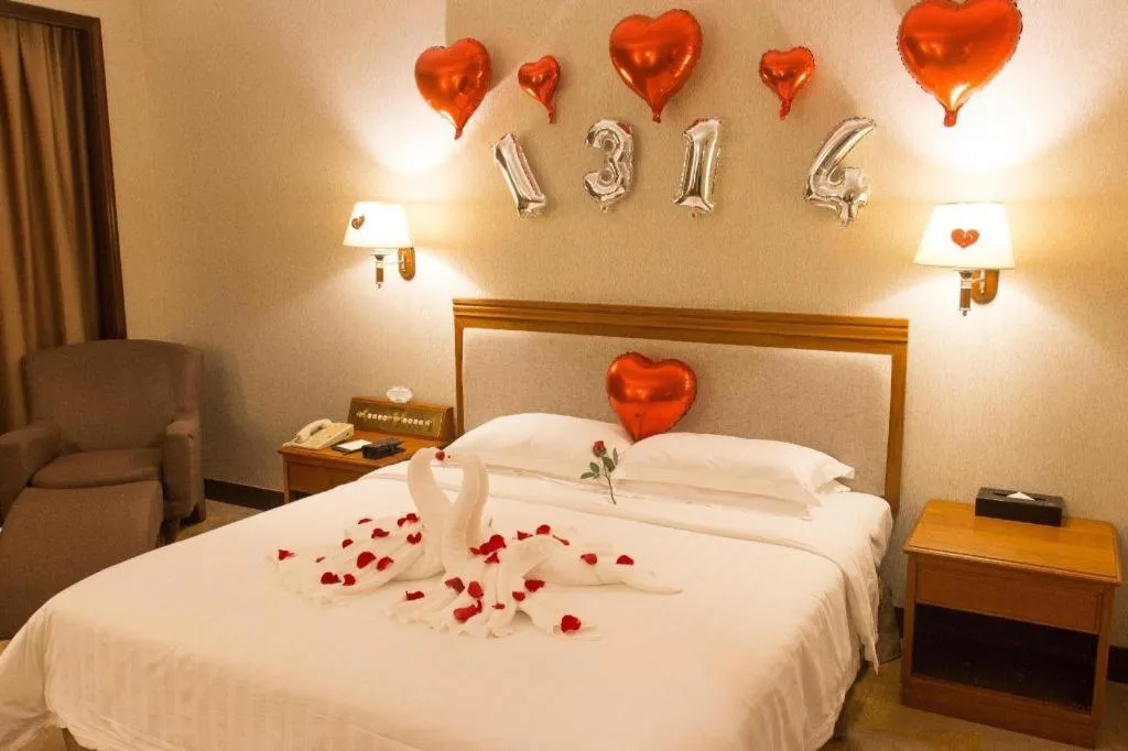 Bed in Fangzhong Holiday Hotel