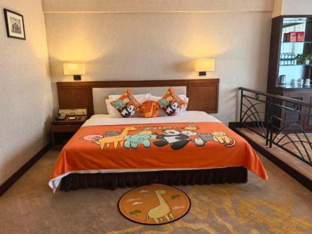 Bed in Fangzhong Holiday Hotel