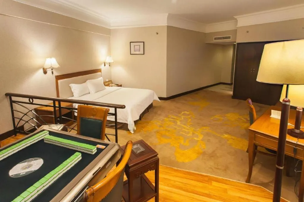 Bed in Fangzhong Holiday Hotel