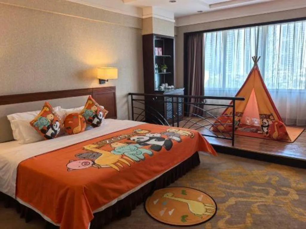 Bed in Fangzhong Holiday Hotel