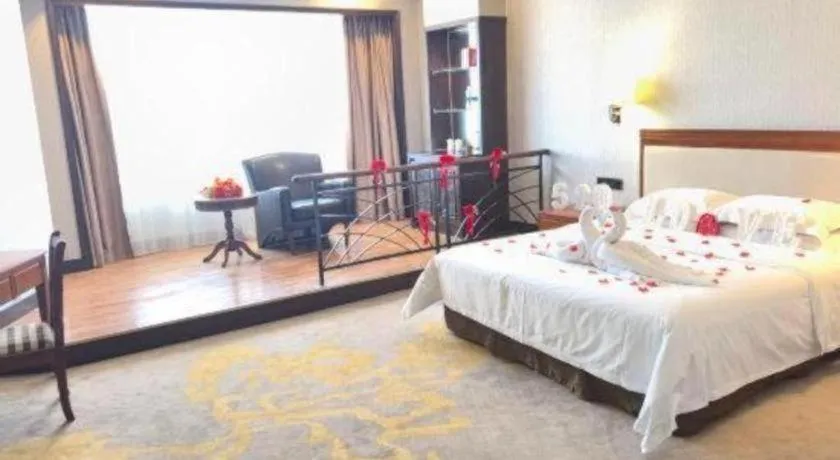 Bed in Fangzhong Holiday Hotel