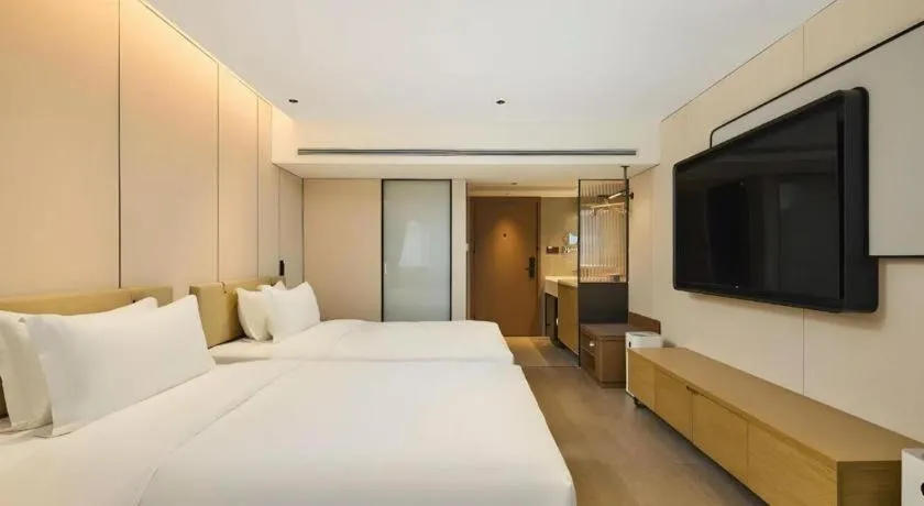 Bed in Lijia Hotel