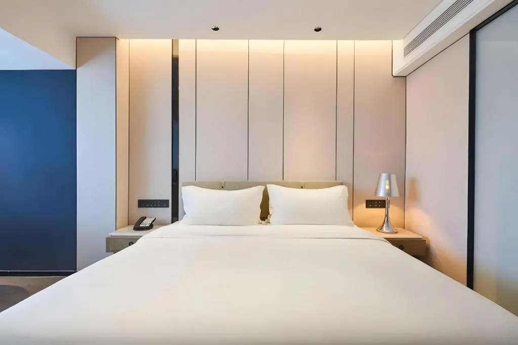 Bed in Lijia Hotel