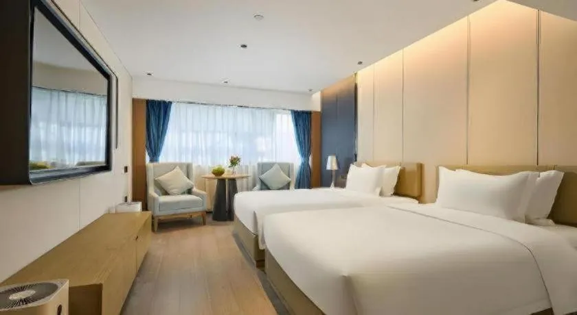 Bed in Lijia Hotel