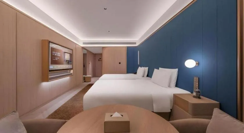 Bed in Lijia Hotel
