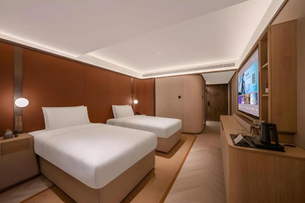 Bed in Lijia Hotel