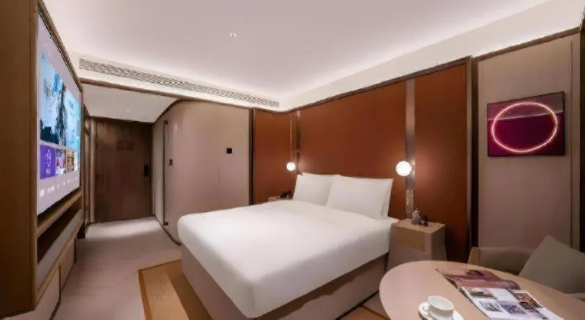 Bed in Lijia Hotel