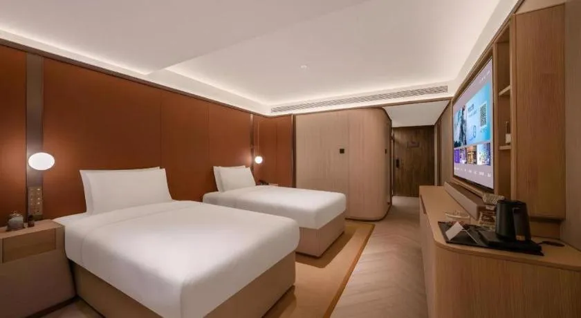 Bed in Lijia Hotel