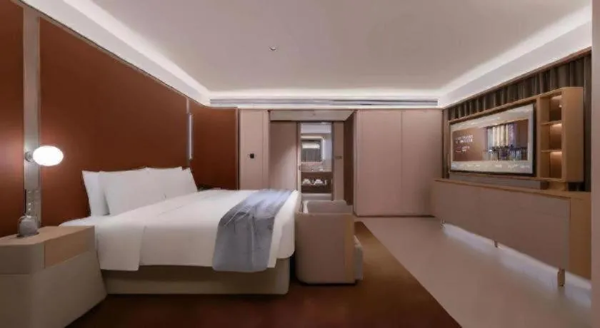 Bed in Lijia Hotel