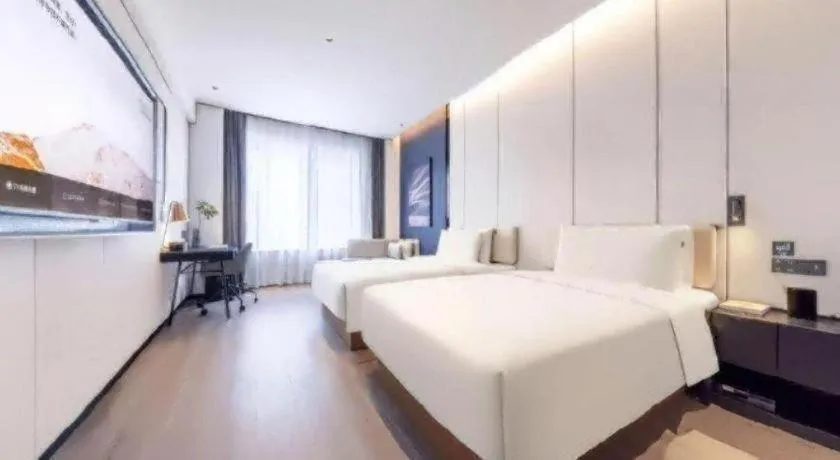 Bed in Lijia Hotel