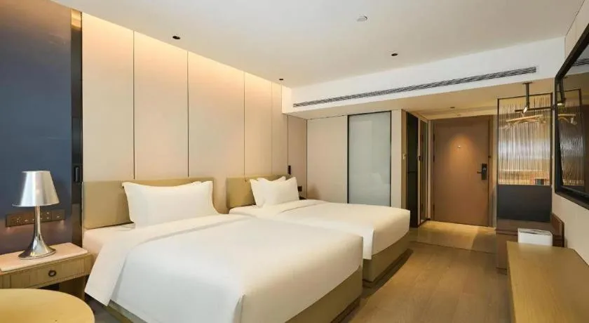 Bed in Lijia Hotel