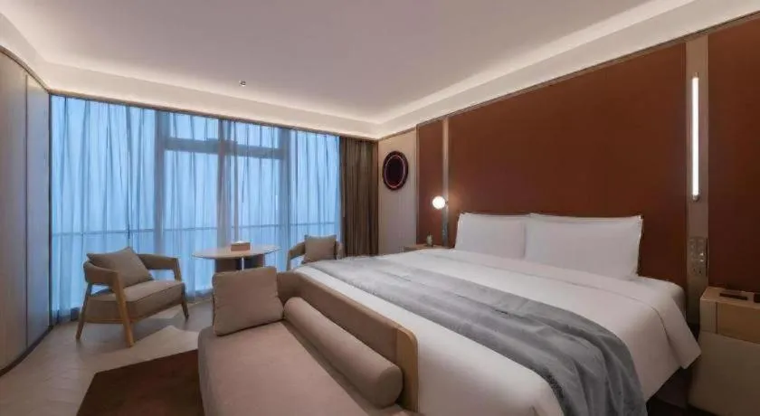 Bed in Lijia Hotel