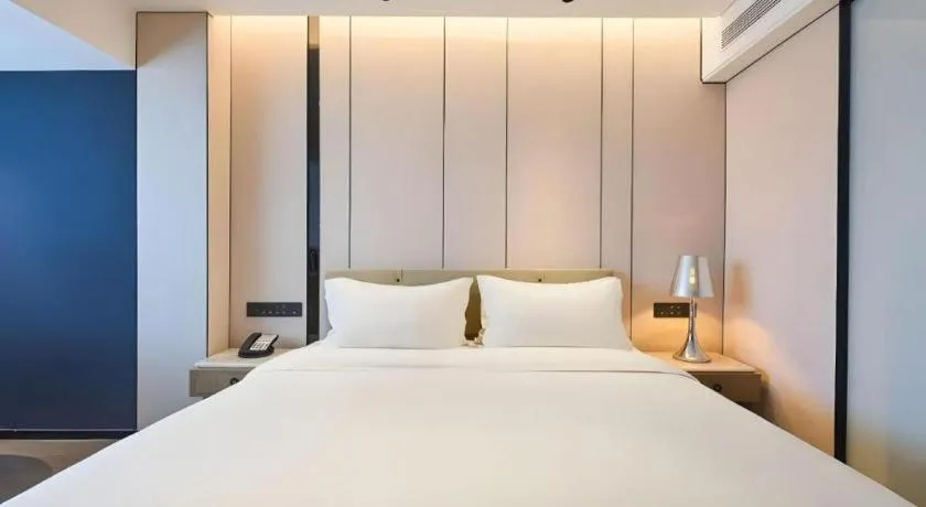 Bed in Lijia Hotel