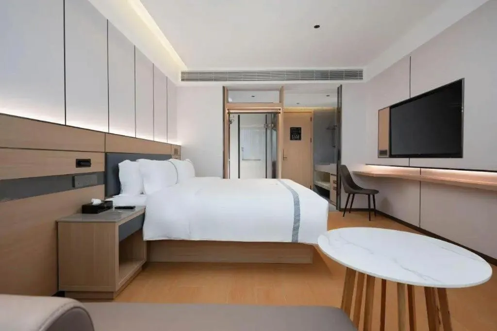 Bed in Lijia Hotel