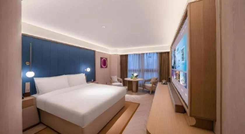 Bed in Lijia Hotel