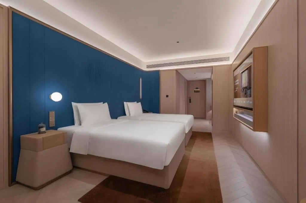 Bed in Lijia Hotel