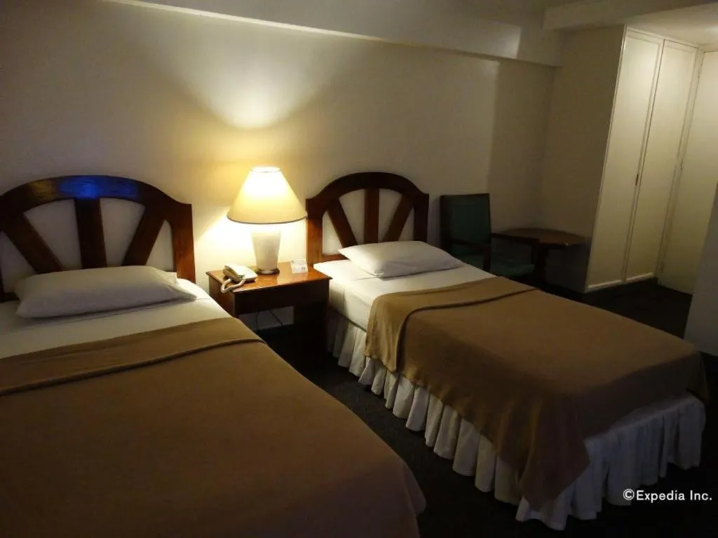 Bed in Adriatico Arms Hotel