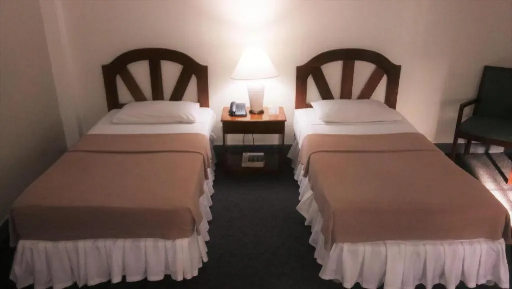 Bed in Adriatico Arms Hotel