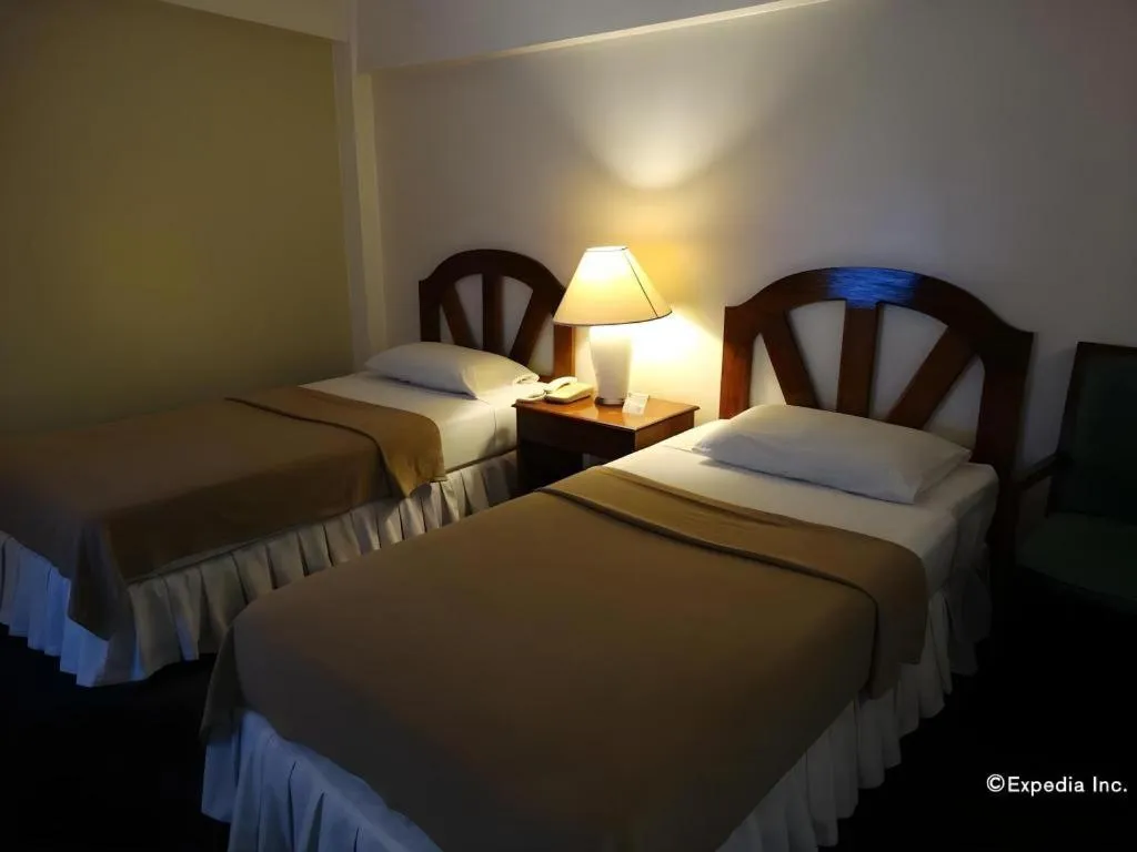 Bed in Adriatico Arms Hotel