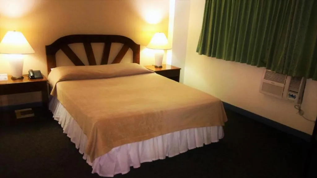 Bed in Adriatico Arms Hotel