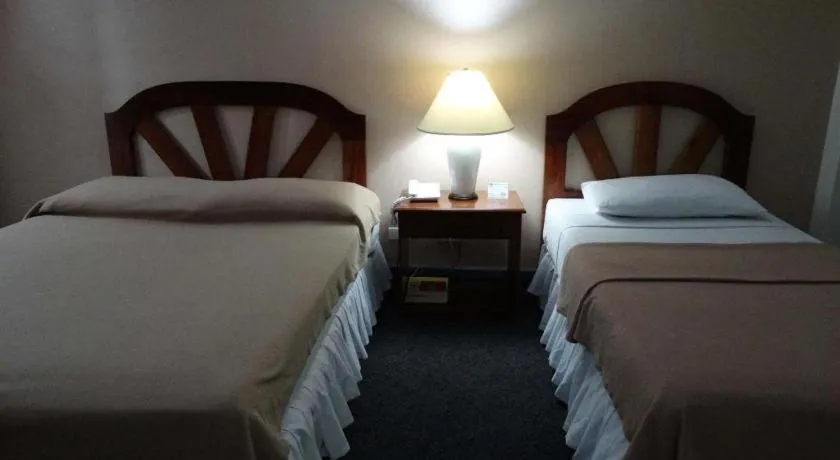 Bed in Adriatico Arms Hotel