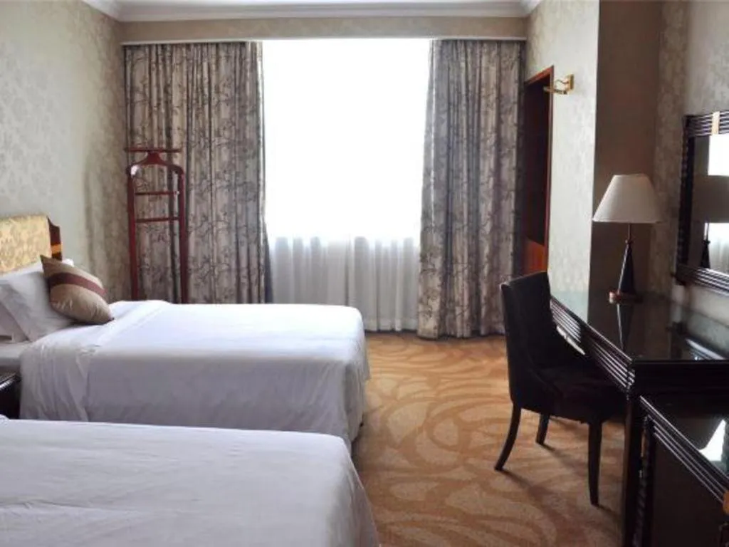 Bed in Chongqing Sunshine Continental Grand Hotel