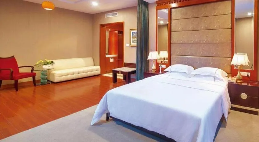 Bed in OSOTTO RECREATION HOTEL