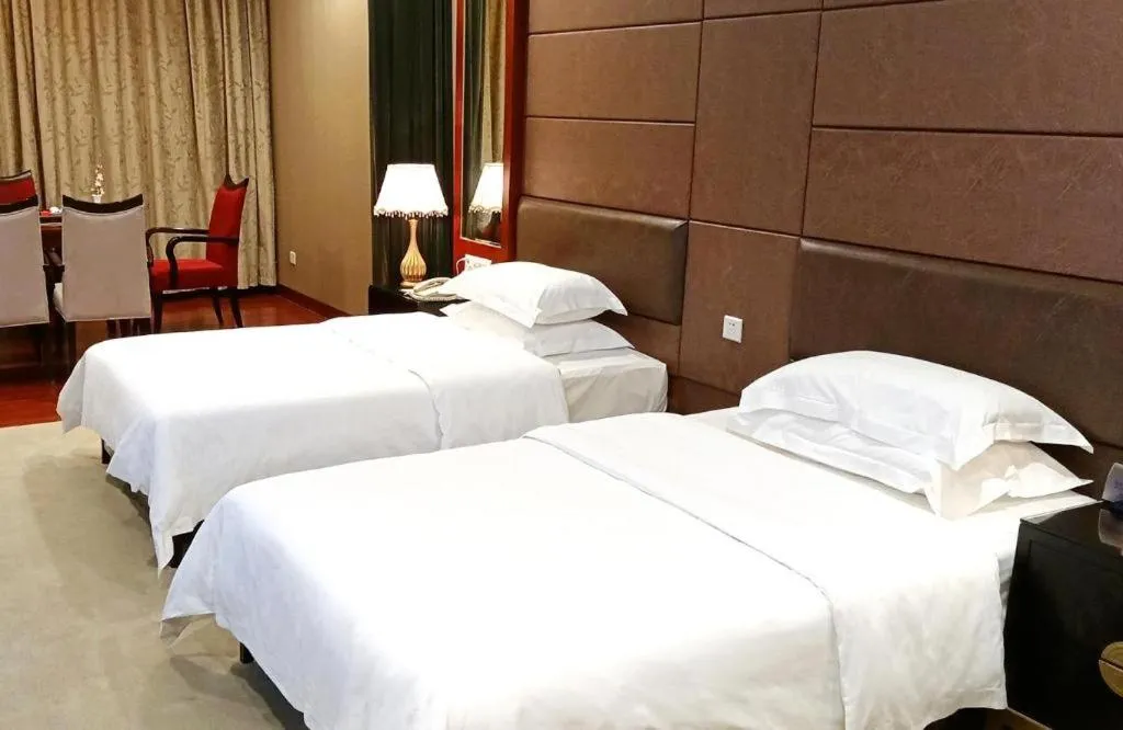 Bed in OSOTTO RECREATION HOTEL