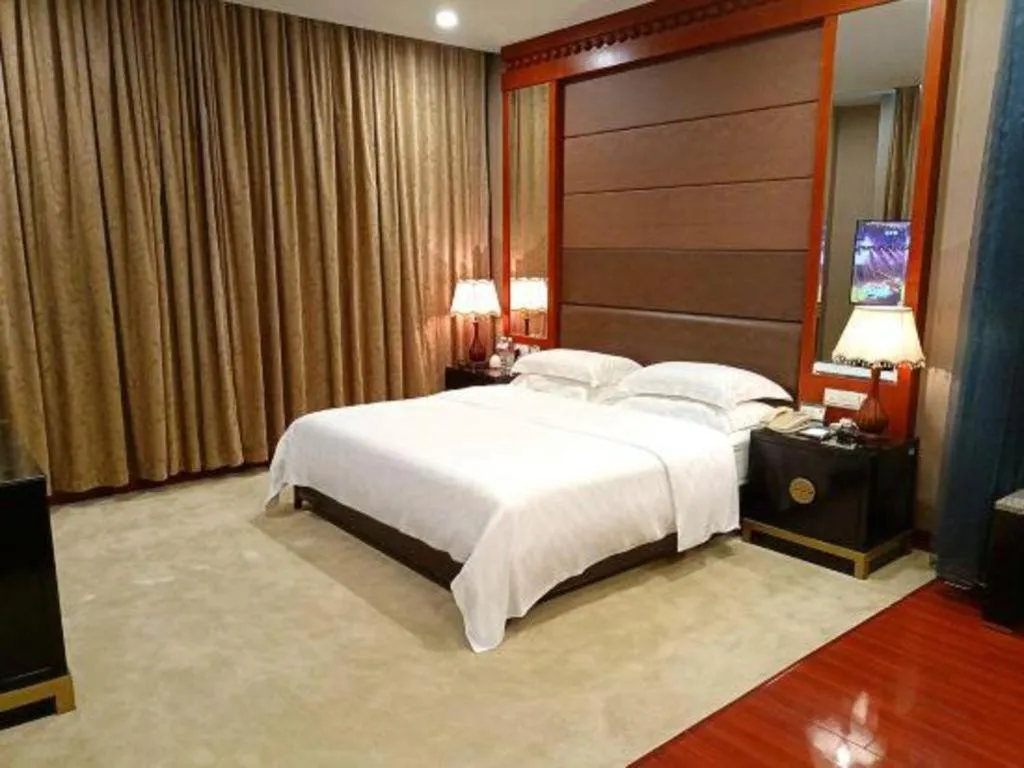 Bed in OSOTTO RECREATION HOTEL