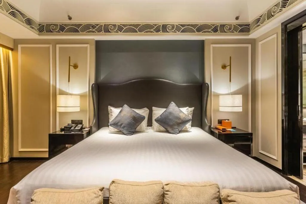 Bed in Grand New Century Hotel Yixing