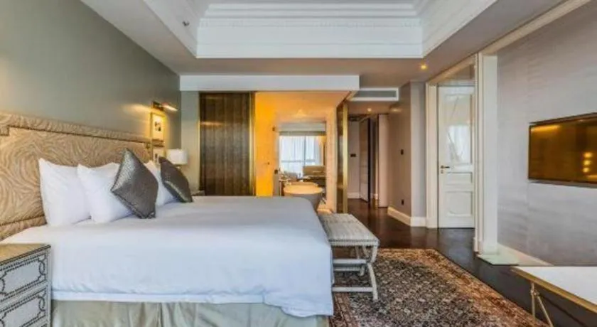 Bed in Grand New Century Hotel Yixing