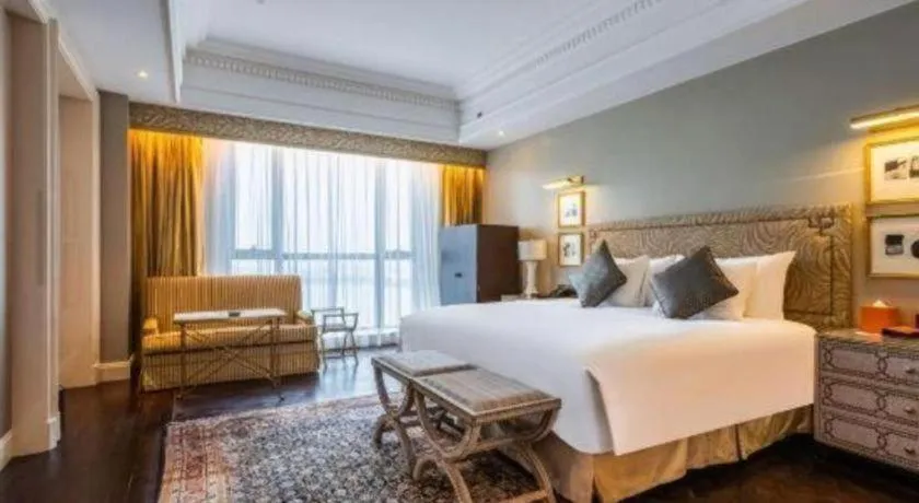 Bed in Grand New Century Hotel Yixing