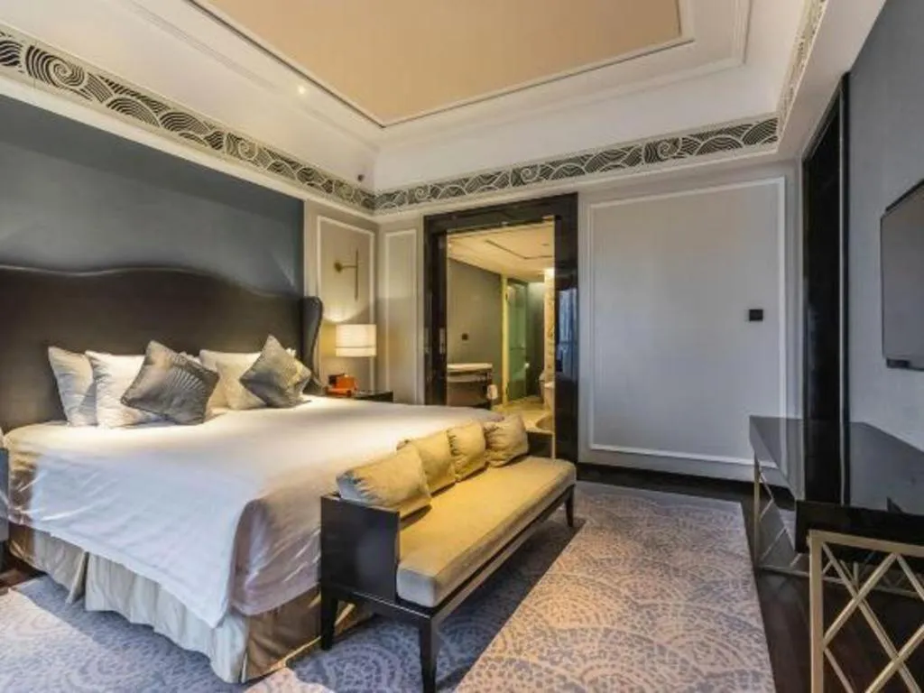Bed in Grand New Century Hotel Yixing