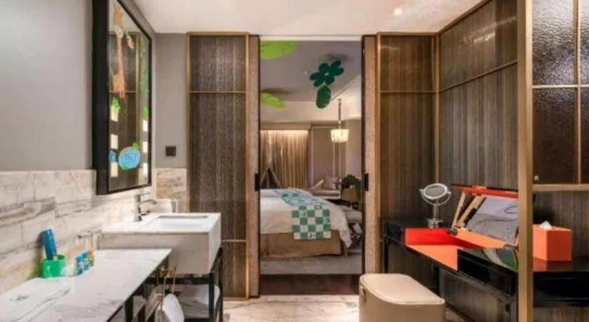 Bed in Grand New Century Hotel Yixing